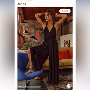 Dani convertible open back one piece jumpsuit. NEVER WORN